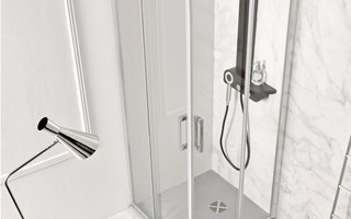 What are the advantages of tempered glass shower enclosures?